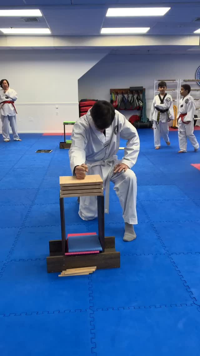 Taekwondo board breaking practice